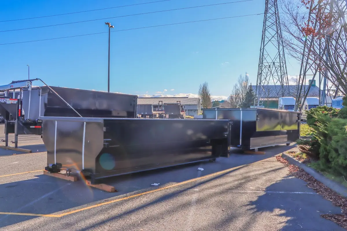 Roll-off dumpster ready for waste disposal at job site for 6 Yard Dumpster Rental in Centerton